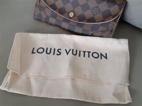 lv dust bag authentic|authentic Lv dust bag.